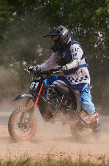 Evoltrix ROGUE MX-01 Off-Road Electric Dirt Bike in Action: Rider Dirt Track Riding Shot